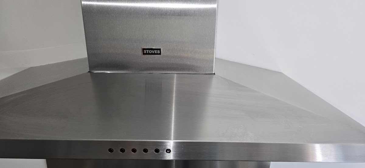 Polished stainless steel cooker hood after cleaning